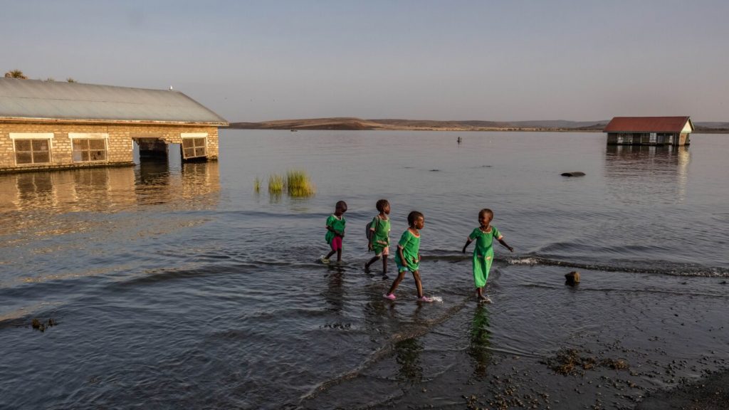 The biggest permanent desert lake threatens with rising waters and hungry crocs